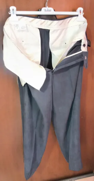 Completo uomo grigio mille righe.