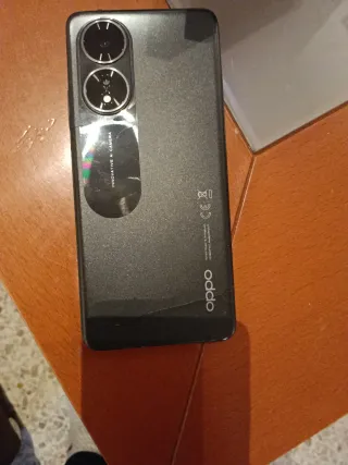 Móvil Oppo 128GB Negro pantalla rota y tapatambien