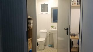 Contenedor oficina con lavabo