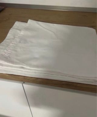 Sábana encimera blanca cama grande