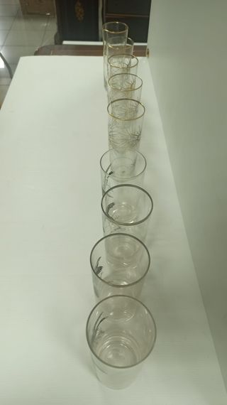 Juego de  vasos con diseño de sol y aves