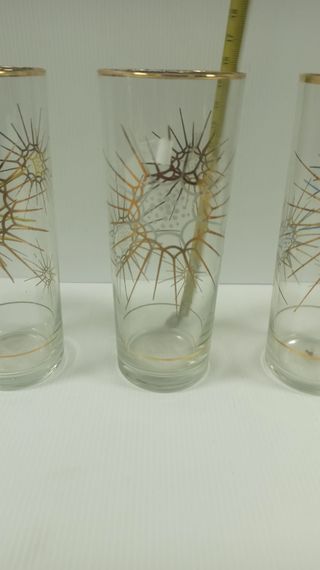 Juego de  vasos con diseño de sol y aves