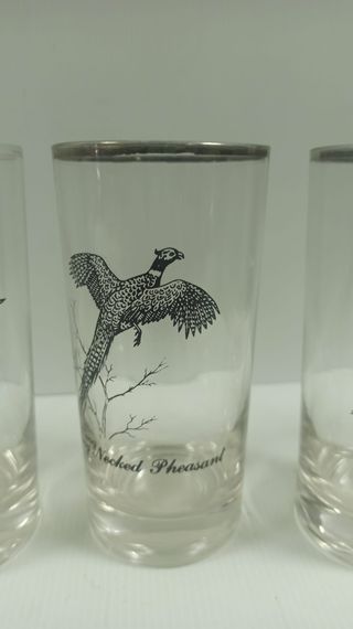 Juego de  vasos con diseño de sol y aves