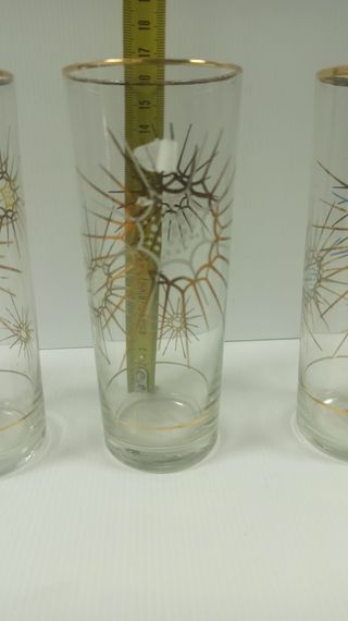 Juego de  vasos con diseño de sol y aves