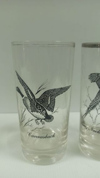 Juego de  vasos con diseño de sol y aves