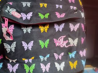 Mochila escolar con mariposas