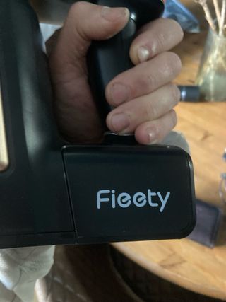 Aspiradora portátil Fieety naranja y negra