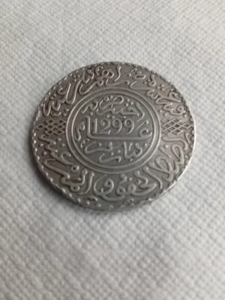 Moneda Árabe 1299