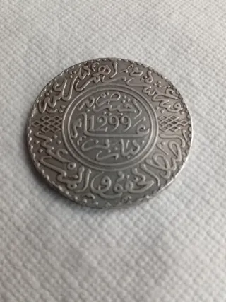 Moneda Árabe 1299
