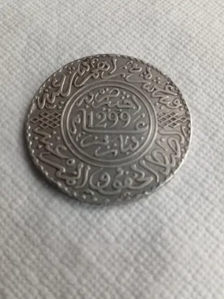 Moneda Árabe 1299
