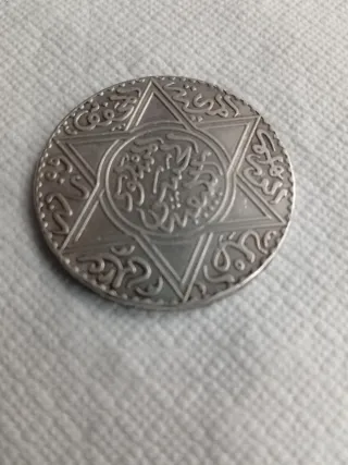 Moneda Árabe 1299