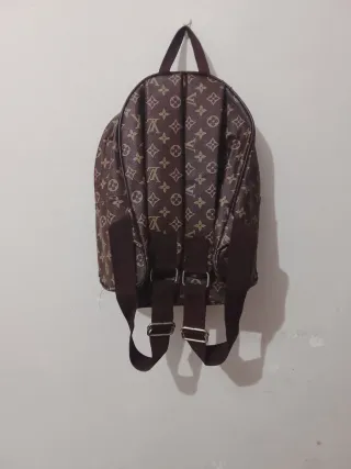 Mochila Louis Vuitton Marrón y Dorada