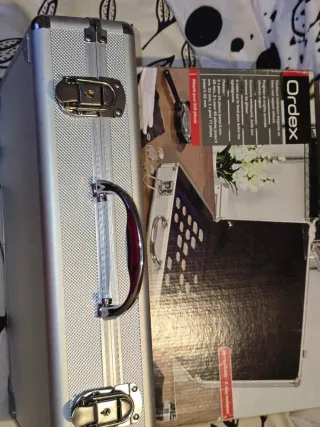 Maletín metalico para coleccionar monedas