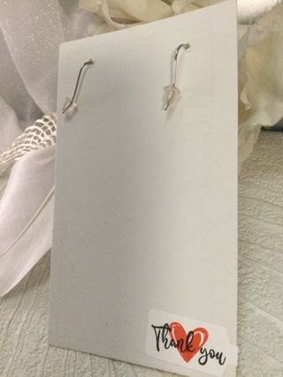 Pendientes Alas con Pluma Blanca