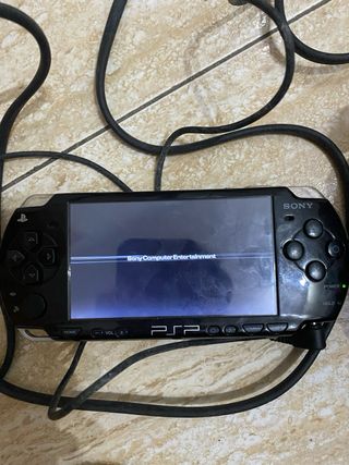 PSP Sony Negra + Funda y UMD