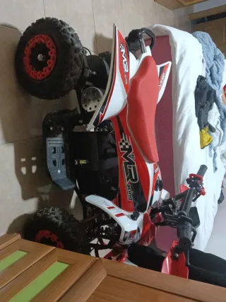 Quad eléctrico infantil