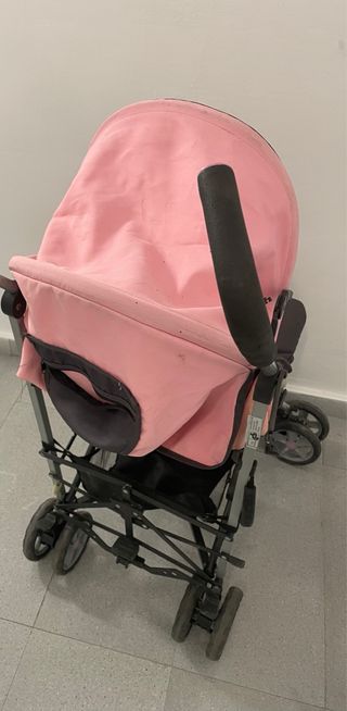 Carro de bebé rosa y gris