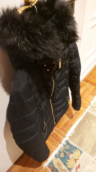 Plumífero relleno azul  tejido suave poco peso