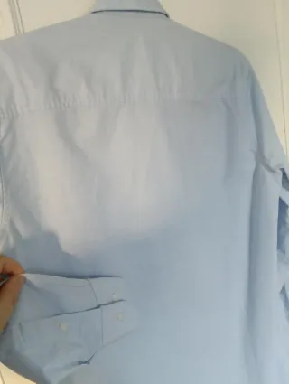 Camisa azul Corte Inglés también como uniforme col