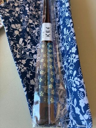 Bacchette cinesi decorate e piattini/ciotoline