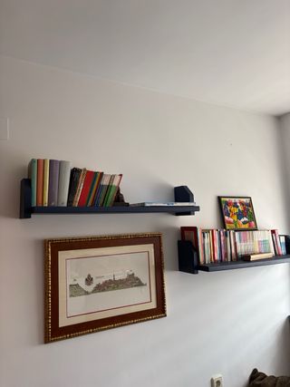 Cama nido infantil con mesa y estanterías