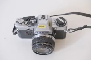 Cámara Olympus OM10 Plata y Negra