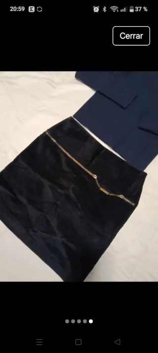 Conjunto jersey azul marino y falda negra