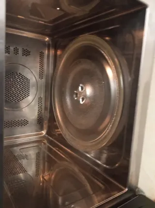 Microondas Candy plateado con grill