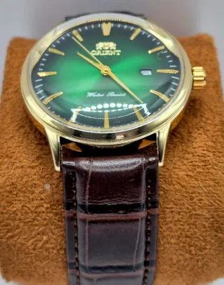 Reloj Mod Orient Dorado y Verde,  Made in Japan