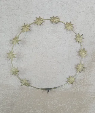 Antiguo halo corona resplandor santo metal