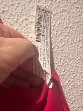 Top asimétrico un hombro fucsia