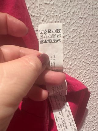 Top asimétrico un hombro fucsia