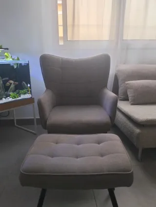 Sillón decorativo gris de tela