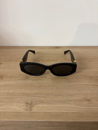 Occhiali da sole Miu Miu neri e oro