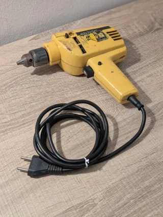 Taladro percutor vintage amarillo