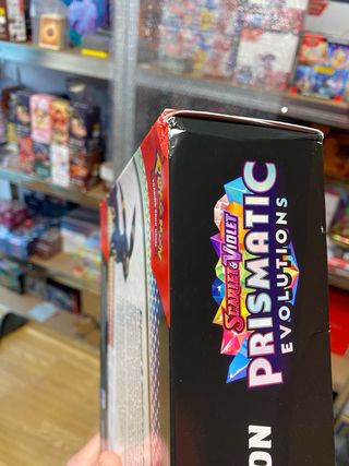 Pokemon Prismatic Evolutions Caja Premium Ingles