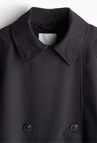 Gabardina negra doble abotonadura