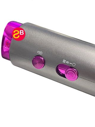 Secador de pelo gris y rosa