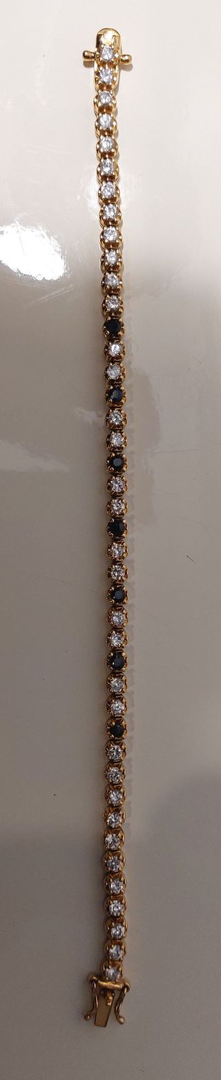 Pulsera b. Oro 18k, plata de ley 925 y 42 zafiros