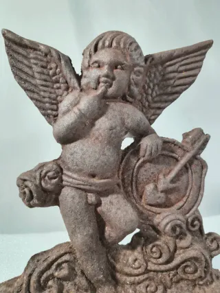 Antiguo tope de puerta Cupido