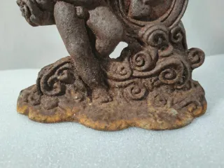 Antiguo tope de puerta Cupido