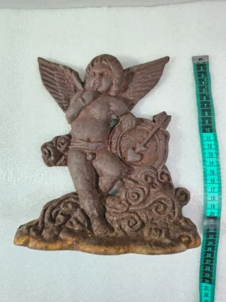 Antiguo tope de puerta Cupido