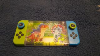 Juguete de agua con dinosaurios