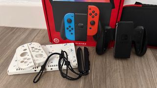 Nintendo Switch OLED + Juegos
