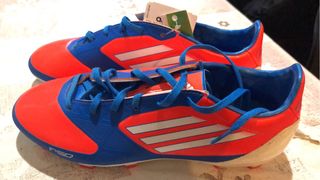 Tacos de fútbol Adidas Naranja y Azul