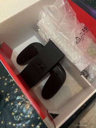 Nintendo Switch 2 Negra + Mario Kart 8 + FC 26