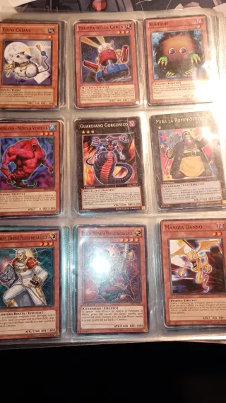 Lotto 184 carte Yu-Gi-Oh miste + fogli raccoglitor