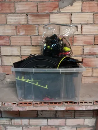 Caja de pistas y accesorios para coches de carrera