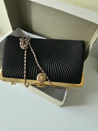 Bolso de fiesta negro y dorado