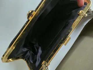 Bolso de fiesta negro y dorado